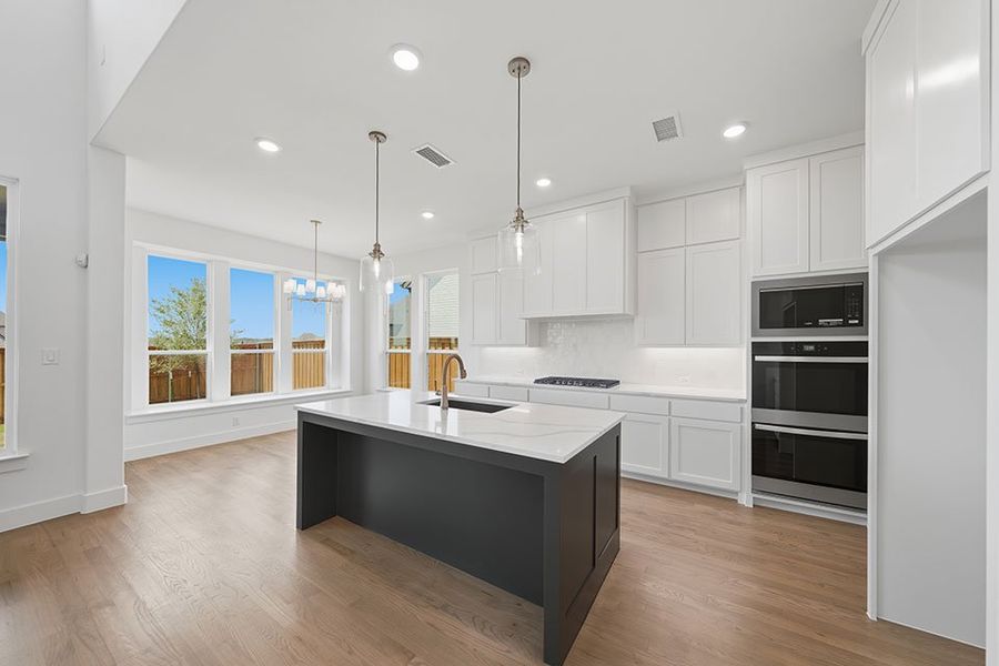 Furnished interior view inside a new home in Furst Ranch, Argyle (Image 6).