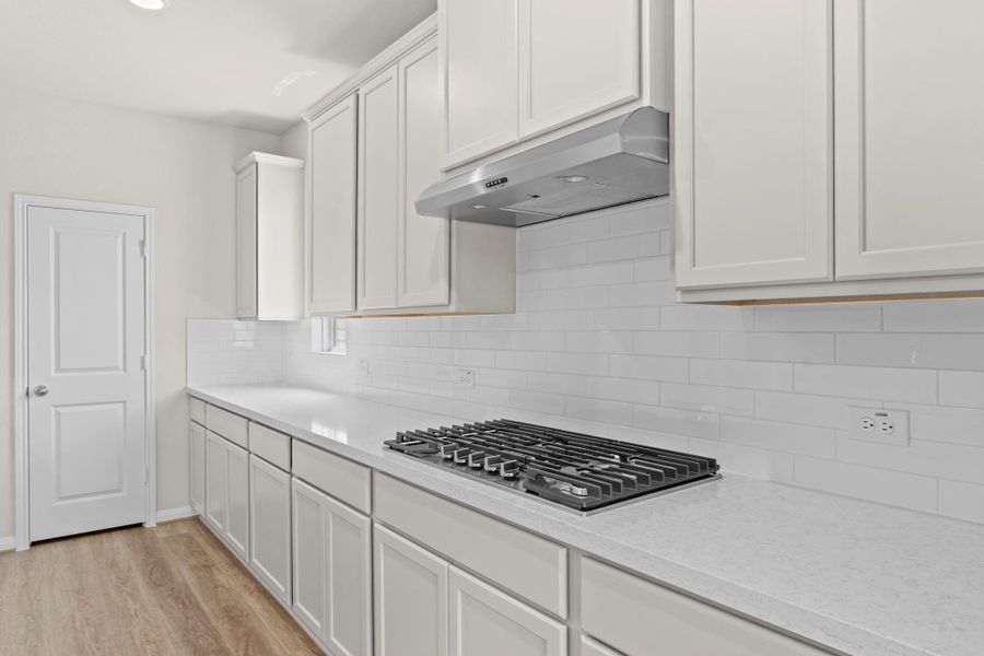 Furnished interior view inside a new home in Bridgeland, Cypress (Image 16).