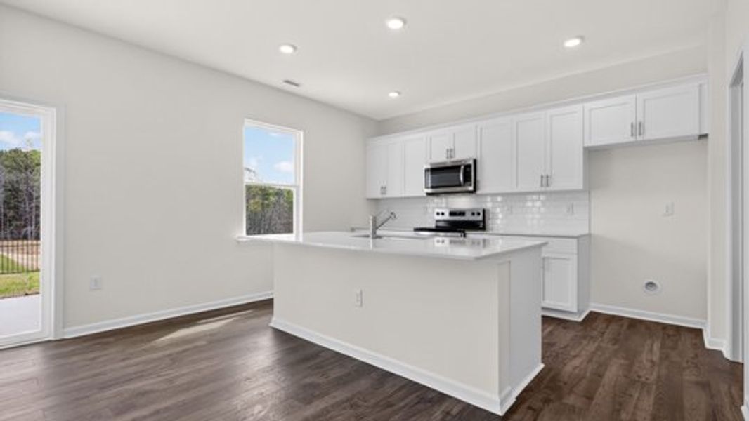 Furnished interior view inside a new home in Shahbain Reserve, Raeford (Image 4).