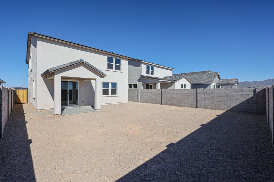 A house with a fence around it. A house with a fence around it.