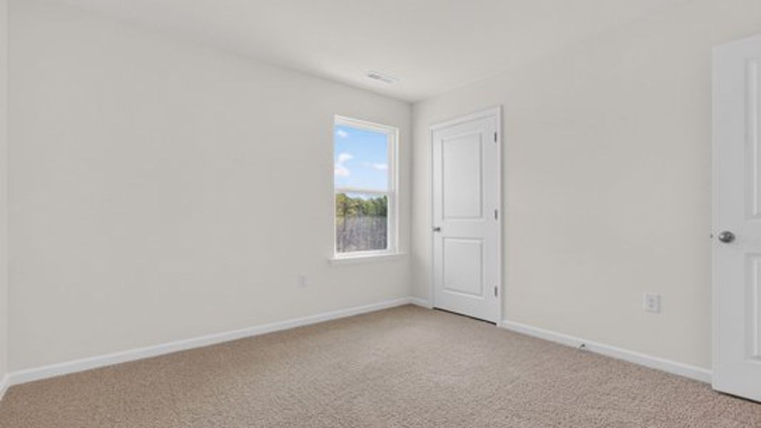 Spacious, unfurnished interior of a new home in Shahbain Reserve, Raeford (Image 30).