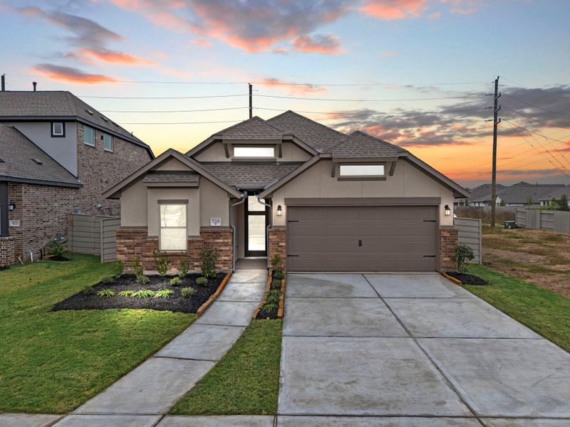 Front exterior of a new home in Pomona 50' & 55', Manvel, TX, highlighting curb appeal (Image 22).