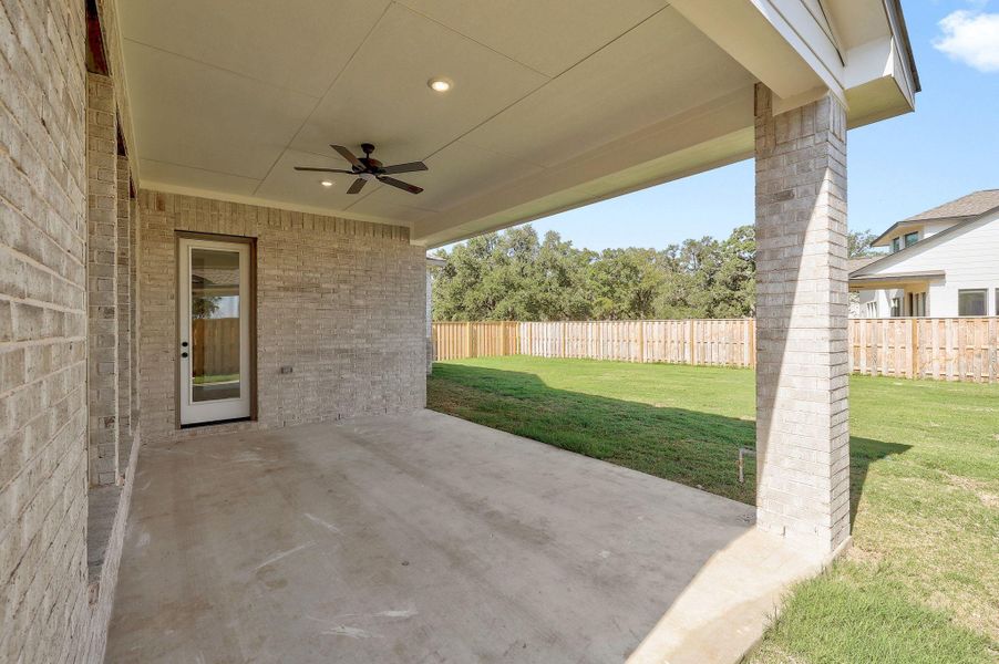 Exterior details and patio area of a home in Parmer Ranch - 60', Georgetown (Image 3).