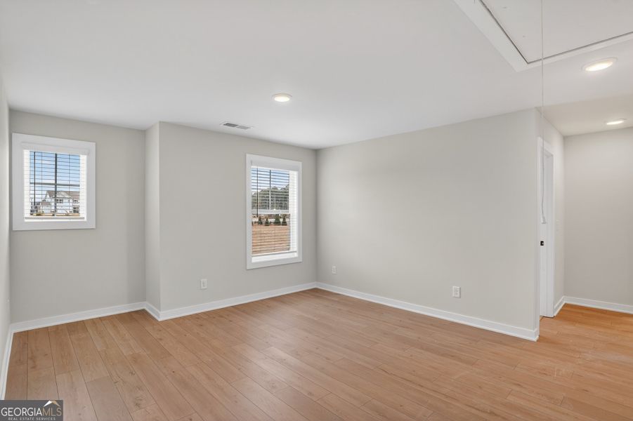 Spacious, unfurnished interior of a new home in The Fairways at Mirror Lake, Villa Rica (Image 26). Spacious, unfurnished interior of a new home in The Fairways at Mirror Lake, Villa Rica (Image 26).