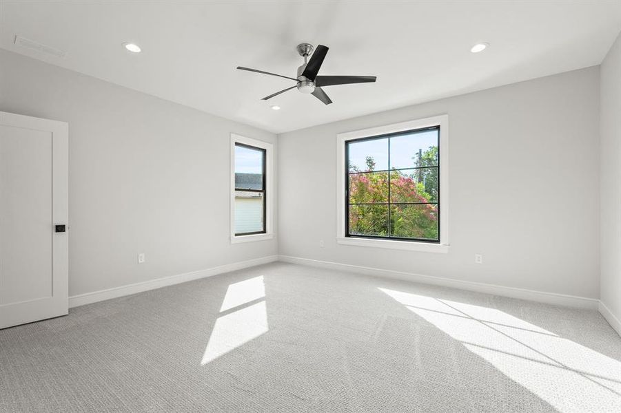 Unfurnished room featuring light carpet, recessed lighting, and ceiling fan Unfurnished room featuring light carpet, recessed lighting, and ceiling fan