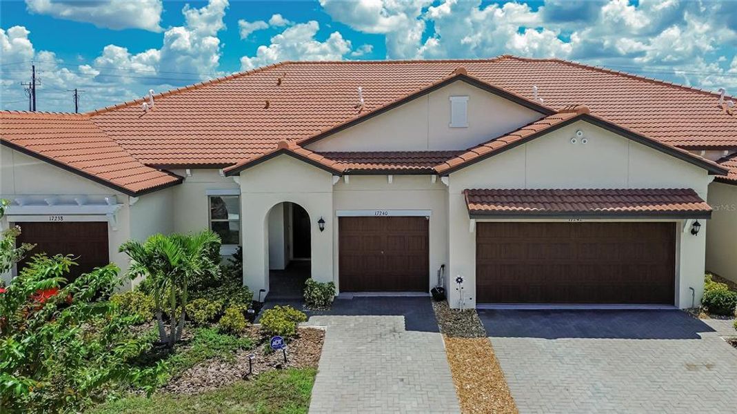 Front exterior of a new home in Southshore Bay Active Adult, Wimauma, FL, highlighting curb appeal (Image 34).