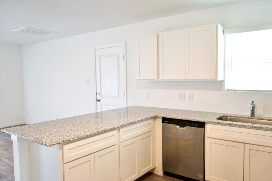 Furnished interior view inside a new home in , Conroe (Image 9).
