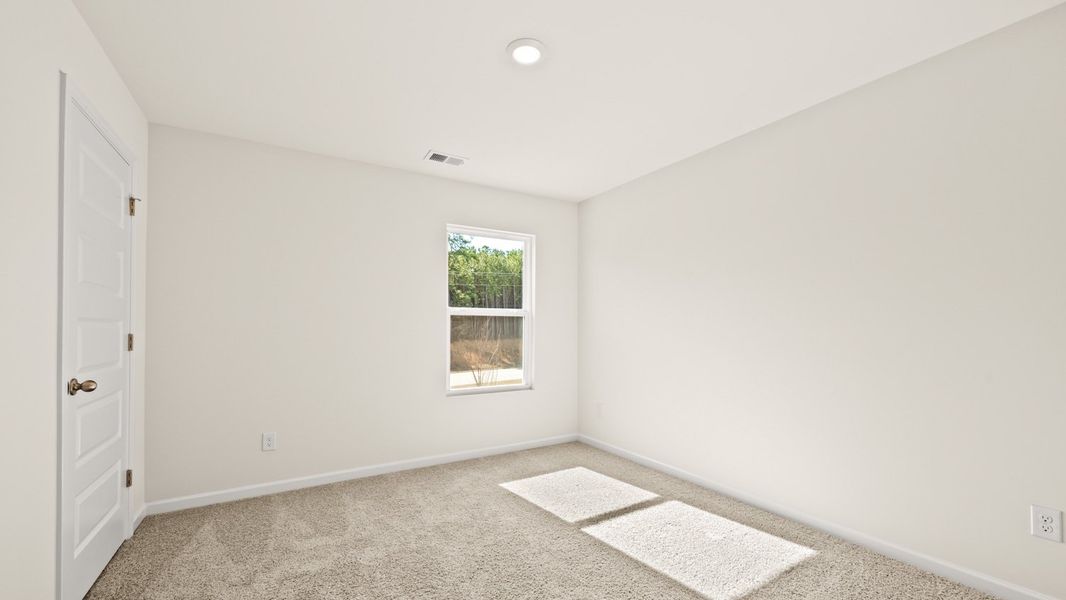 Representative unfurnished interior of a home built from the Flora by D.R. Horton in Poplar Preserve, Newnan (Image 16).