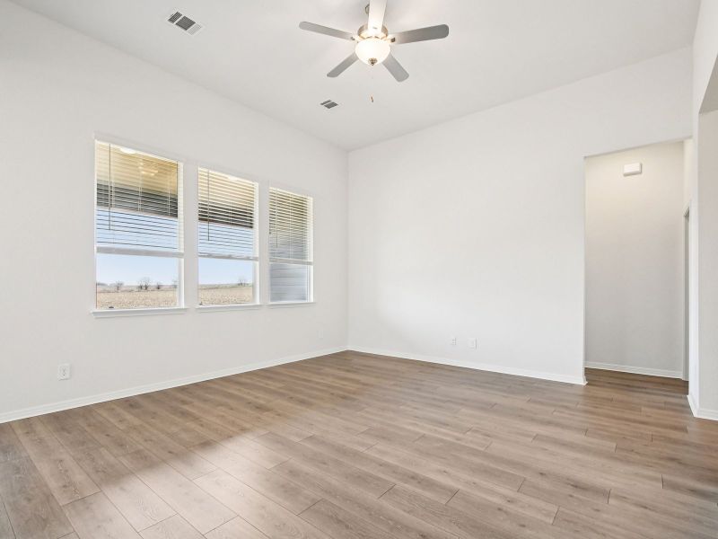 Spacious, unfurnished interior of a new home in Prairie Winds - Executive Collection, Hutto (Image 8).