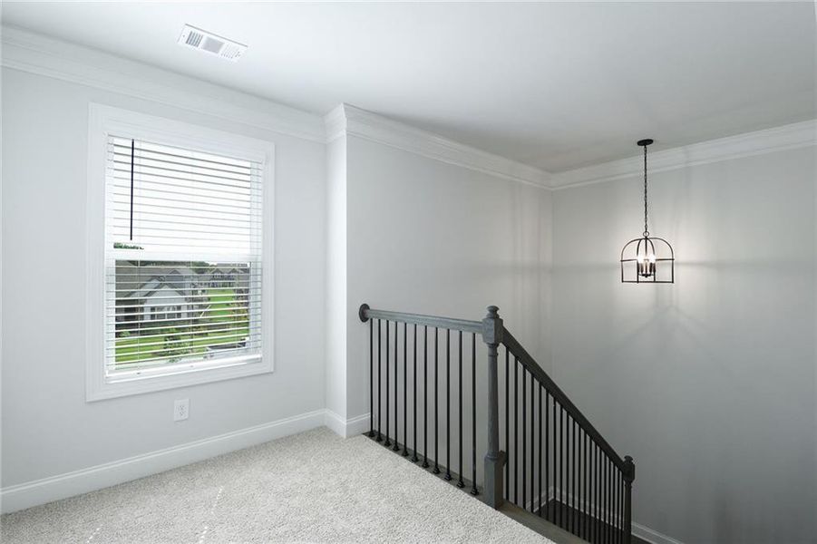 Spacious, unfurnished interior of a new home in Calgary Downs, Winder (Image 11).