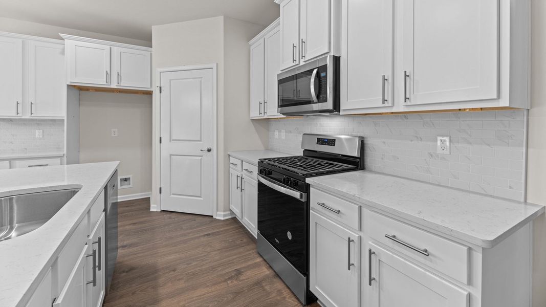 Representative furnished interior of a home built from the Dover by D.R. Horton in South Pinehurst Cottages, Pinehurst (Image 5). Representative furnished interior of a home built from the Dover by D.R. Horton in South Pinehurst Cottages, Pinehurst (Image 5).