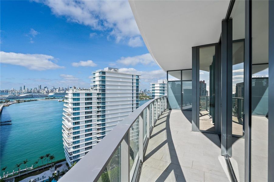 Front exterior of a new home in , Miami Beach, FL, highlighting curb appeal (Image 1). Front exterior of a new home in , Miami Beach, FL, highlighting curb appeal (Image 1).