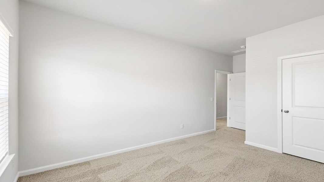 Spacious, unfurnished interior of a new home in The Crossing at St. James, Summerville (Image 17).