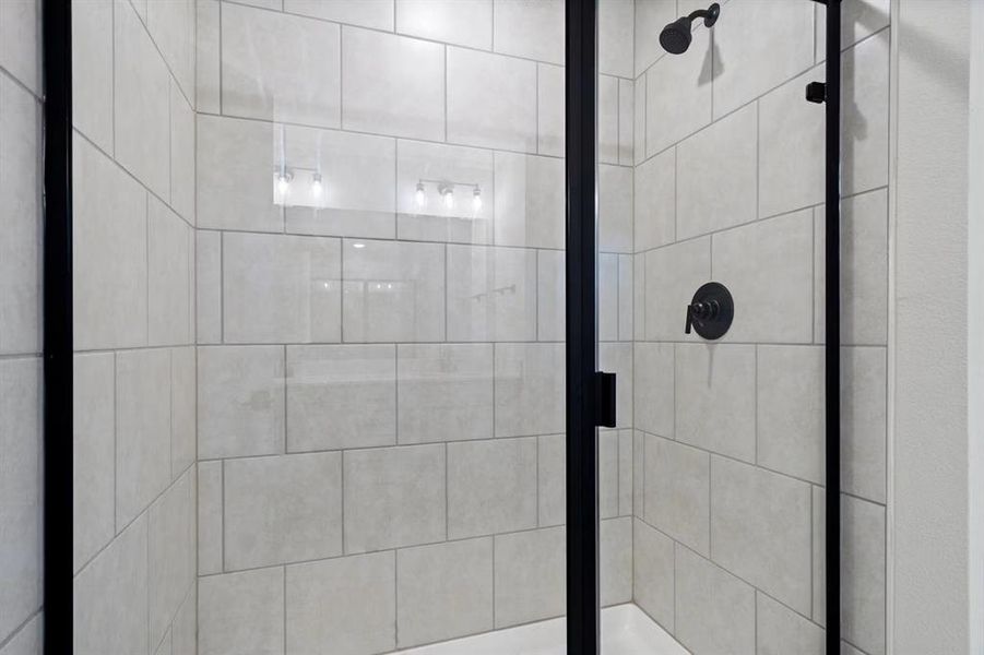 Bathroom with an enclosed shower