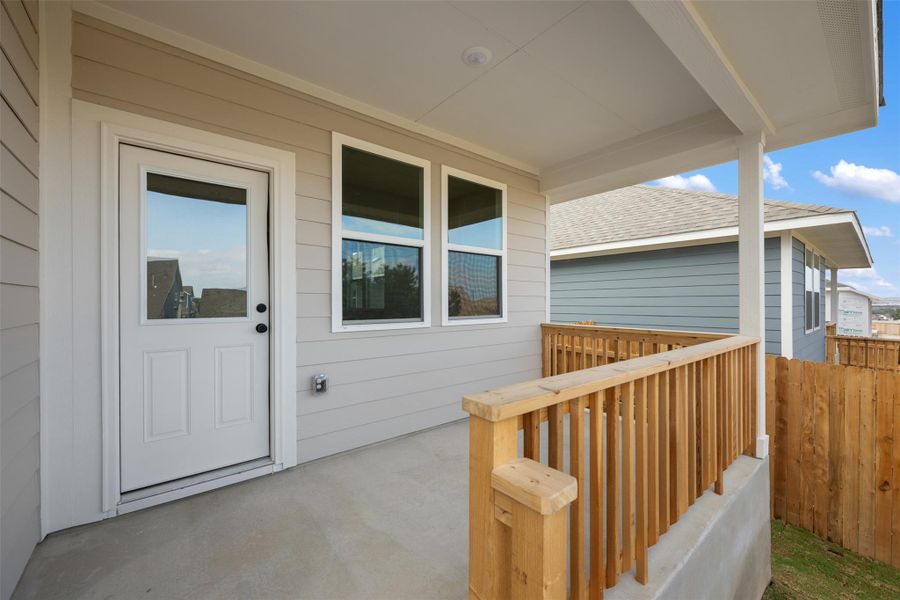 Exterior details and patio area of a home in Cannon Ranch 40s, Dripping Springs (Image 12).