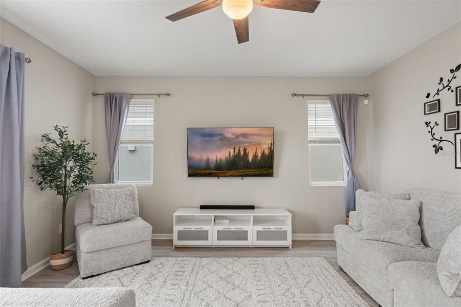Furnished interior view inside a new home in Seasons at The Grove, Mascotte (Image 11).