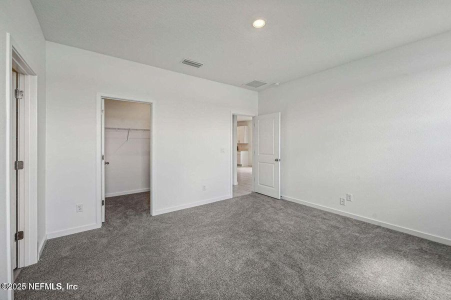 Spacious, unfurnished interior of a new home in Lakes at Bella Lago - Signature Series, Green Cove Springs (Image 18).