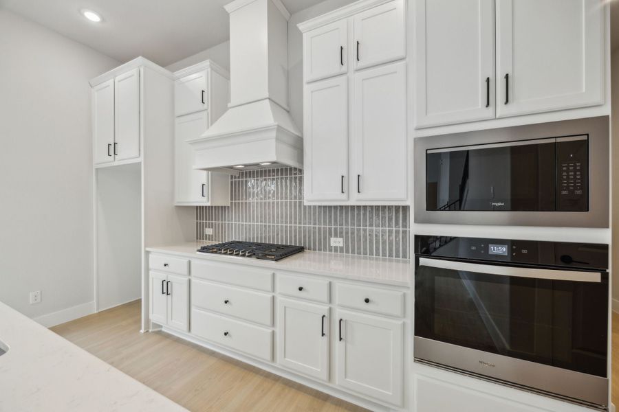 Furnished interior view inside a new home in Newman Village Townhomes, Frisco (Image 6).