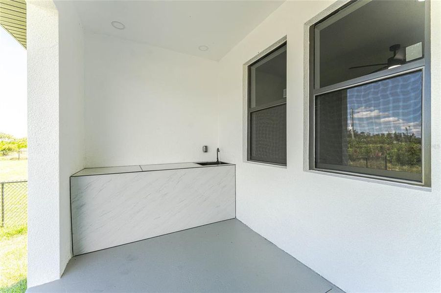 Exterior details and patio area of a home in , Port Charlotte (Image 32).