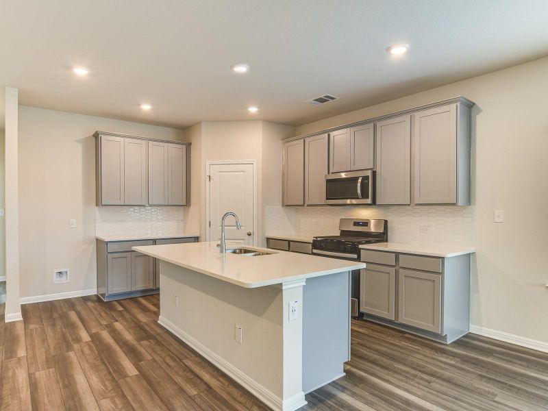 Photo is not of the actual home, but is an inspirational photo of builder’s model home and may depict options, furnishings, and/or decorator features that are not included