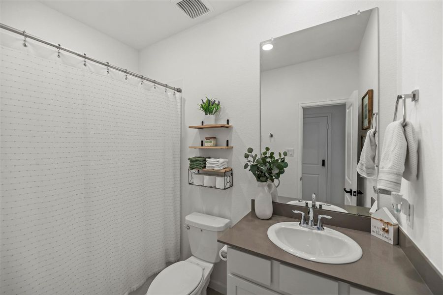 Furnished interior view inside a new home in The Trails, New Caney (Image 30). Furnished interior view inside a new home in The Trails, New Caney (Image 30).