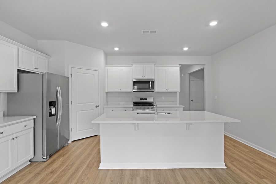 Furnished interior view inside a new home in Pineview North, Summerville (Image 10).