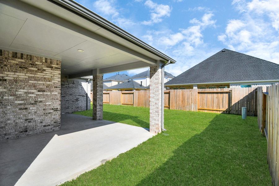 Exterior details and patio area of a home in Bradbury Forest, Spring (Image 3). Exterior details and patio area of a home in Bradbury Forest, Spring (Image 3).