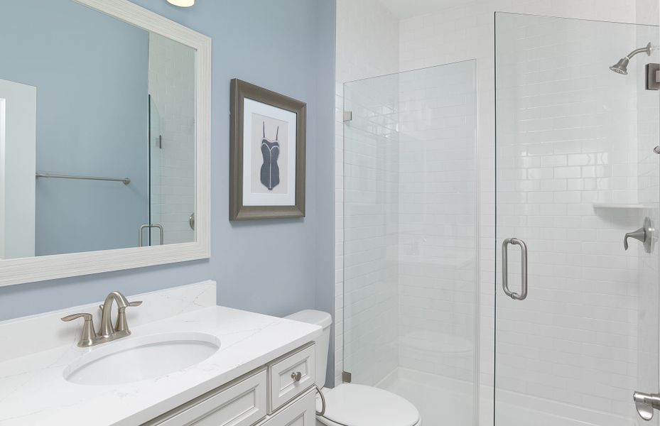 Modern Owner's Bath with a frameless walk-in shower. Modern Owner's Bath with a frameless walk-in shower.