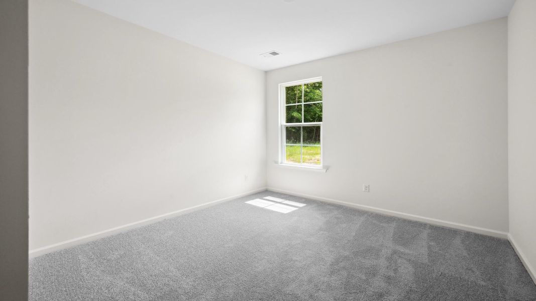 Spacious, unfurnished interior of a new home in Creekside at Andrews, Summerville (Image 22).