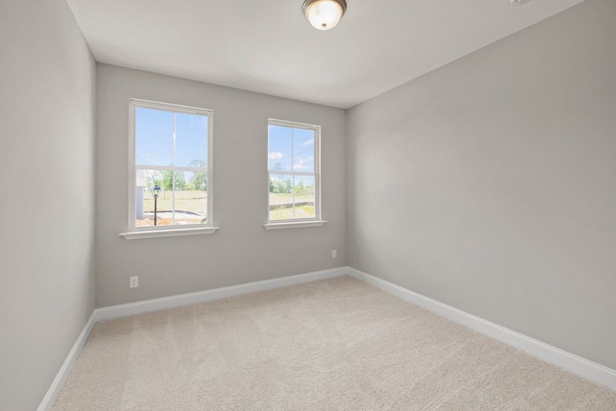 Representative unfurnished interior of a home built from the Glynn by UnionMain Homes in Austin Springs, Bethlehem (Image 22).