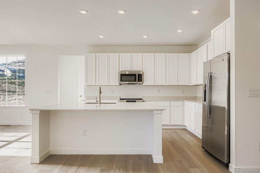 Furnished interior view inside a new home in Ken-Caryl Ranch, Littleton (Image 4).