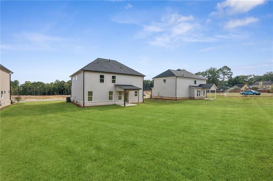 Front exterior of a new home in , Lawrenceville, GA, highlighting curb appeal (Image 24).