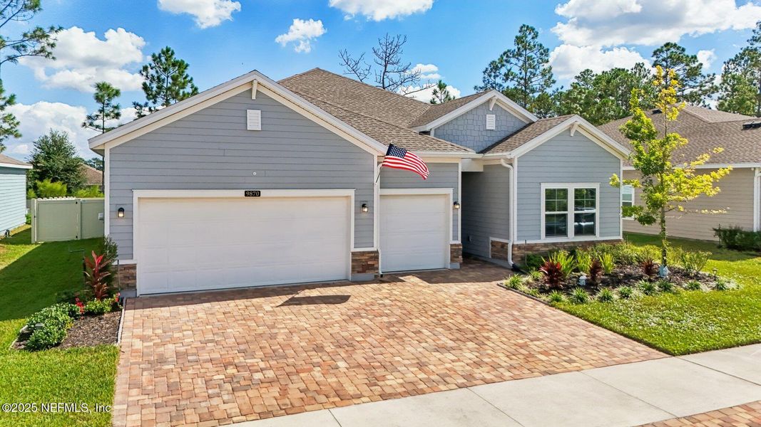 Front exterior of a new home in Longleaf: Longleaf 60s, Jacksonville, FL, highlighting curb appeal (Image 2).