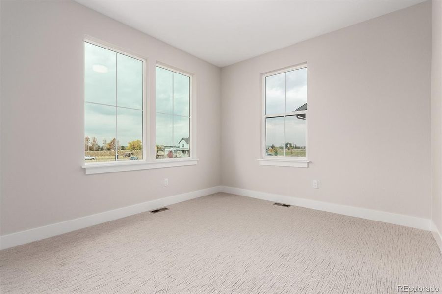 Spacious, unfurnished interior of a new home in West Grange, Longmont (Image 11).