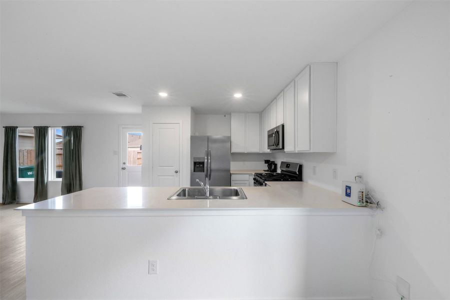 Kitchen offers ample counter space.