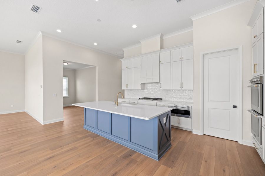 Representative furnished interior of a home built from the Aurora by Riverside Homes in Hidden Creek at SilverLeaf, St. Augustine (Image 12).