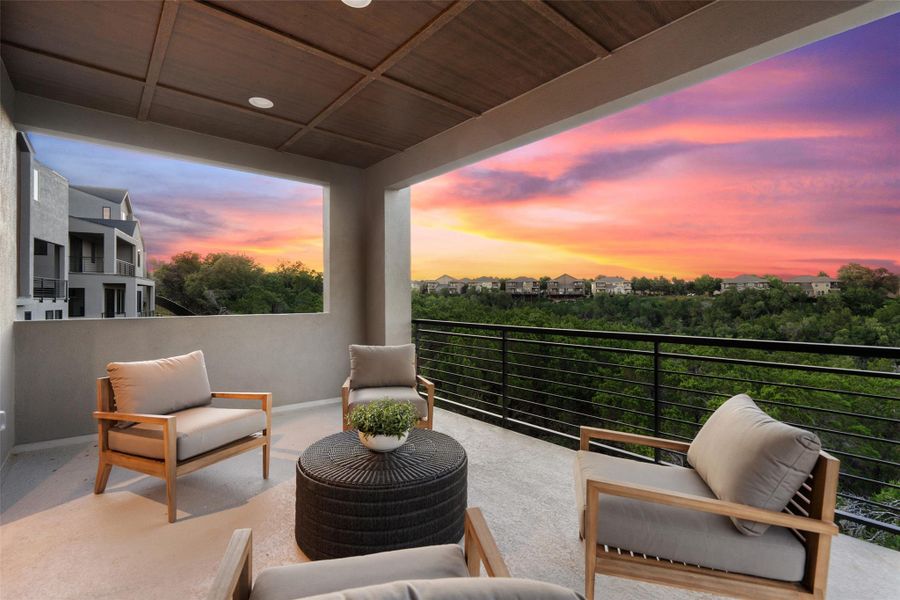 Unwind on this terrace, offering sweeping vistas of the neighborhood and captivating sunset views. Unwind on this terrace, offering sweeping vistas of the neighborhood and captivating sunset views.