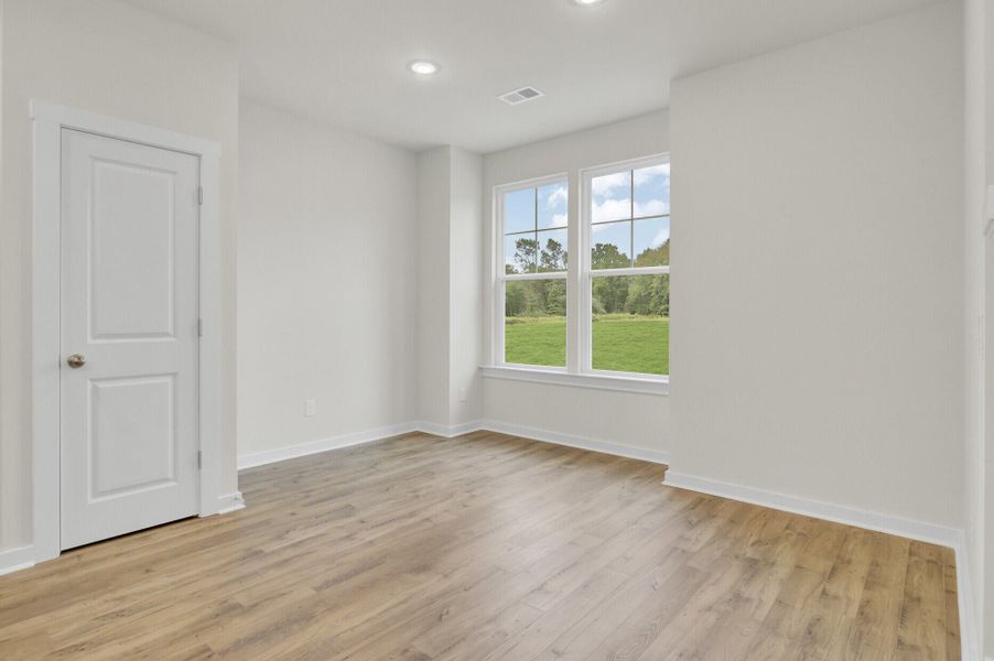 Spacious, unfurnished interior of a new home in Indigo Grove Townhomes, Johns Island (Image 15).
