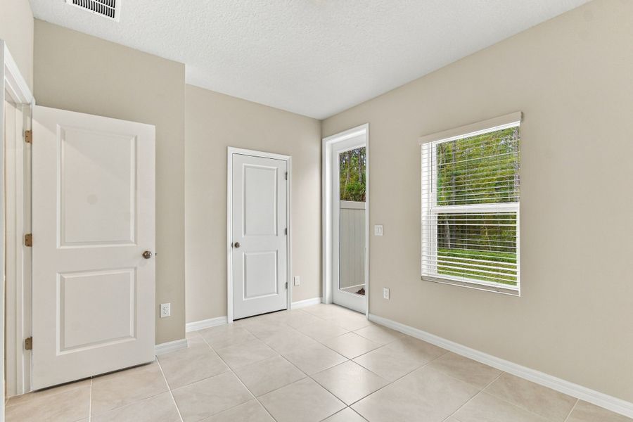 Spacious, unfurnished interior of a new home in Preserve at The Cays – The Driftwood Series, Daytona Beach (Image 13). Spacious, unfurnished interior of a new home in Preserve at The Cays – The Driftwood Series, Daytona Beach (Image 13).