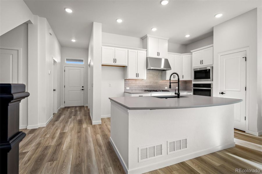 Furnished interior view inside a new home in Revel Crossing at Wolf Ranch – The Outlook Collection, Colorado Springs (Image 7).