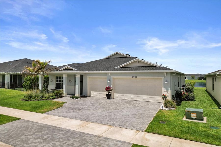 Front exterior of a new home in , Port St. Lucie, FL, highlighting curb appeal (Image 1). Front exterior of a new home in , Port St. Lucie, FL, highlighting curb appeal (Image 1).