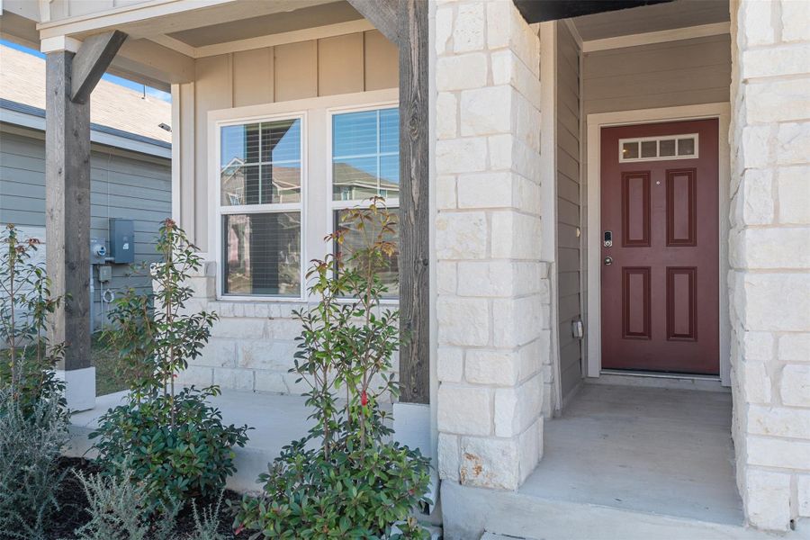 Exterior details and patio area of a home in Butler Farms - Reserve Collection, Liberty Hill (Image 23).