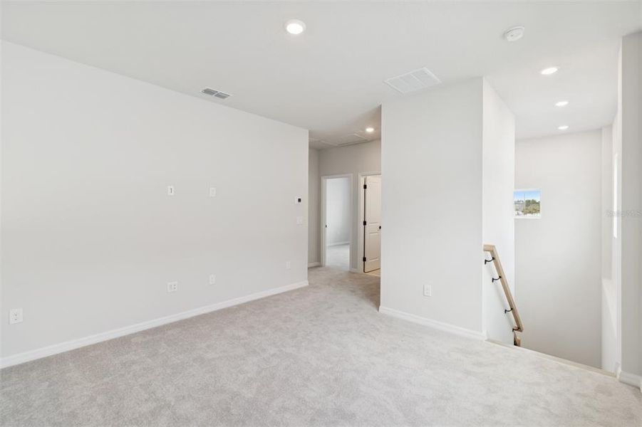 Spacious, unfurnished interior of a new home in Laureate Park at Lake Nona - Garden Series, Orlando (Image 35).