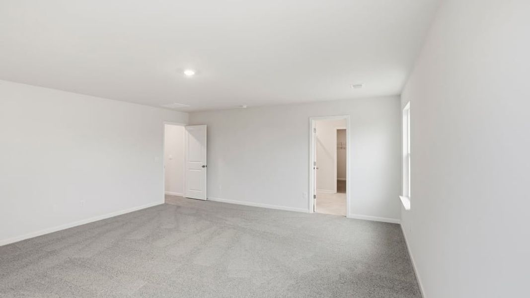 Spacious, unfurnished interior of a new home in Waverly Station, Greenwood (Image 32).