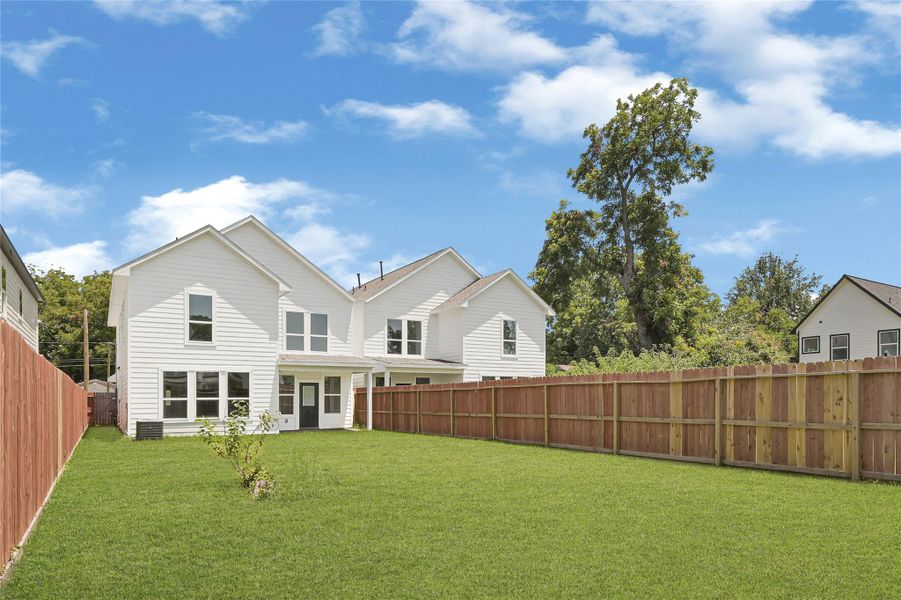 Additional view of the private backyard and home's exterior. Additional view of the private backyard and home's exterior.