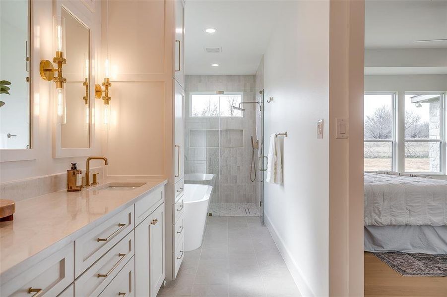 Primary bathroom with double vanity & tower
