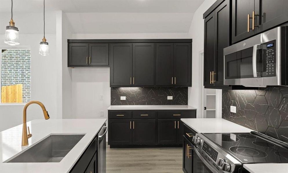 Kitchen featuring the Noir Collection