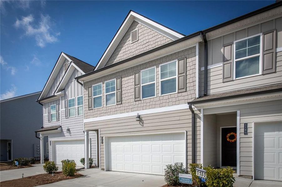Front exterior of a new home in , Villa Rica, GA, highlighting curb appeal (Image 22).