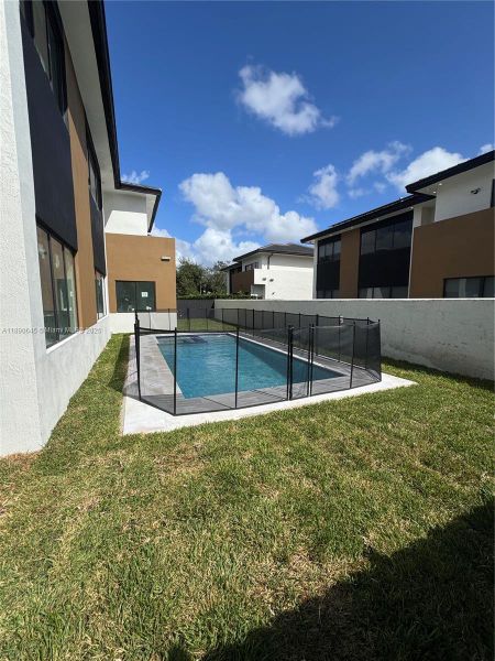 Exterior details and patio area of a home in , Miami (Image 3).