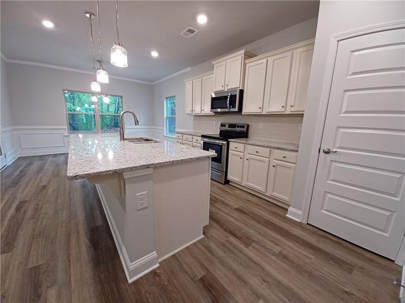 Furnished interior view inside a new home in Magnolia Villas, Cornelia (Image 6).